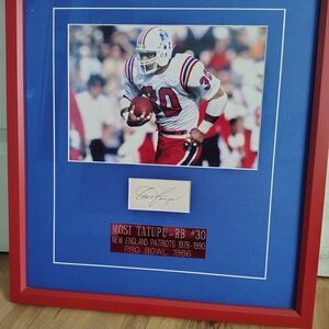 Framed Football Memorabilia with Red and Blue Matting